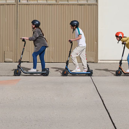 Helmeted children with C2-series scooters including blue-accent C2 Pro models