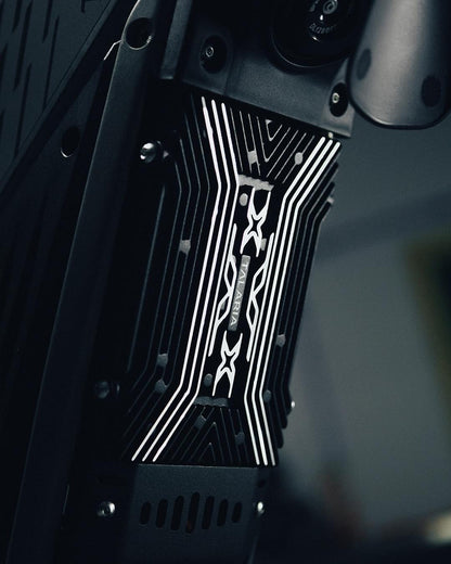 Close-up of the Talaria XXX electric motorbike controller and cooling fins.